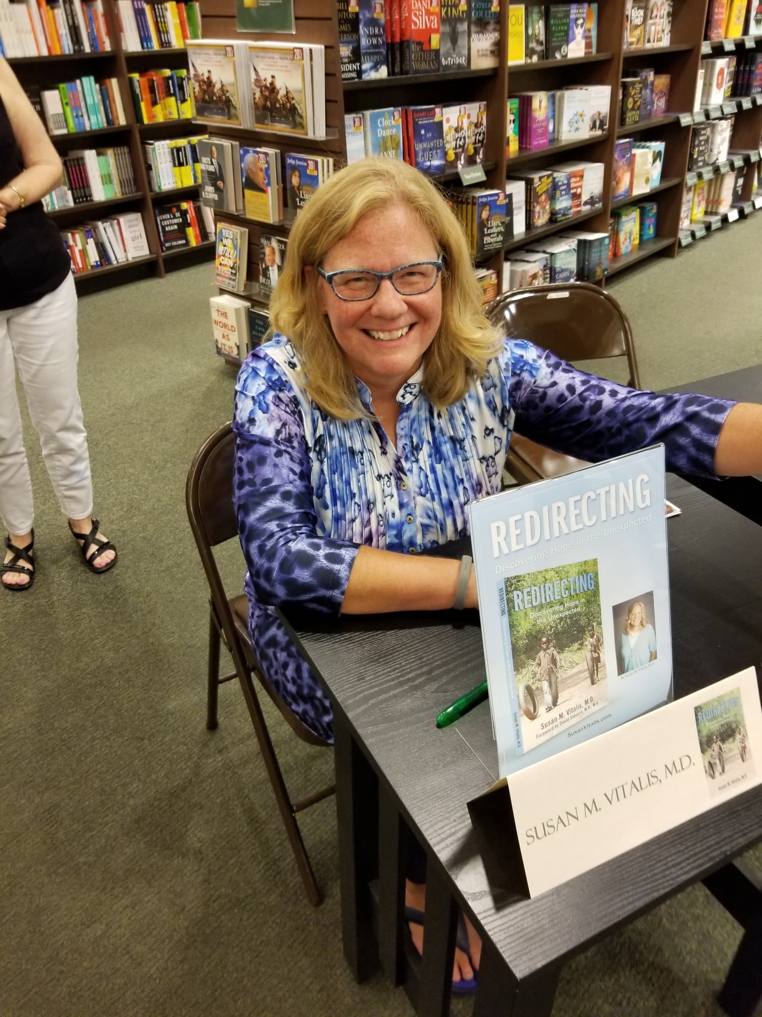 Dr. Susan Vitalis at a book signing event for Still Listening