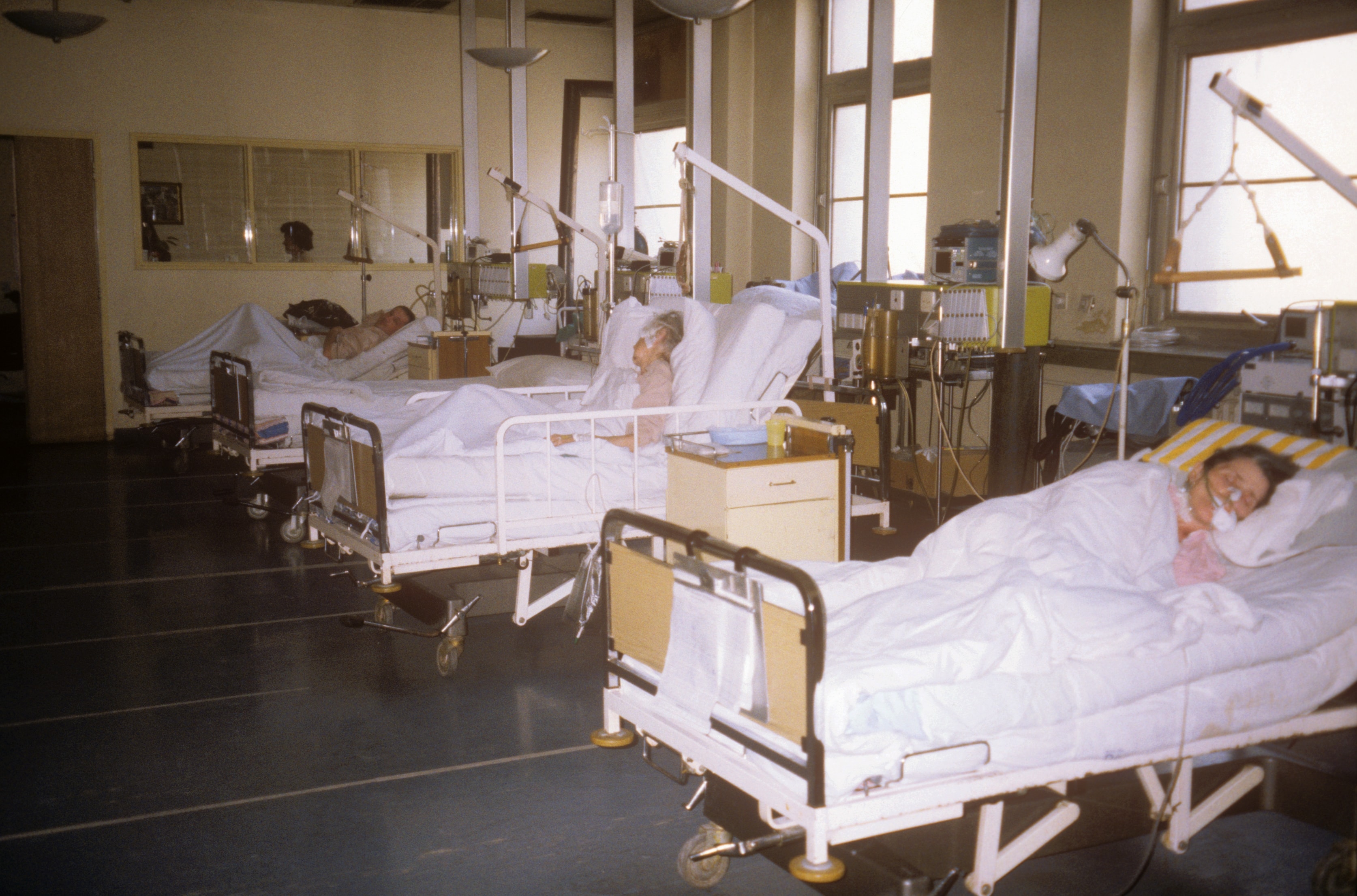 Hospital ward with patients in beds in Bosnia