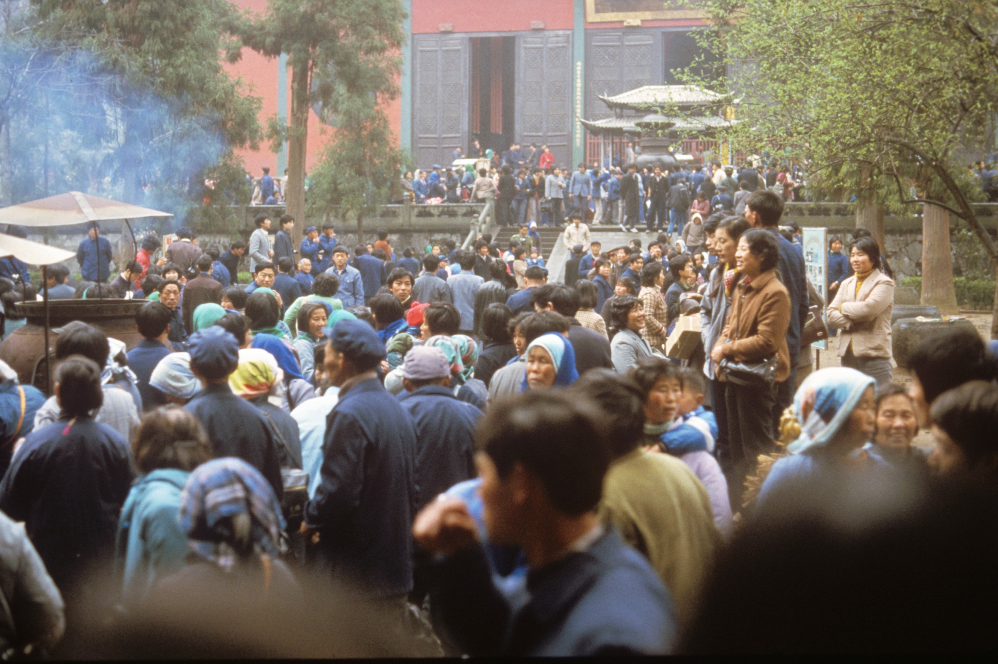 Large crowd gathered at temple courtyard, China