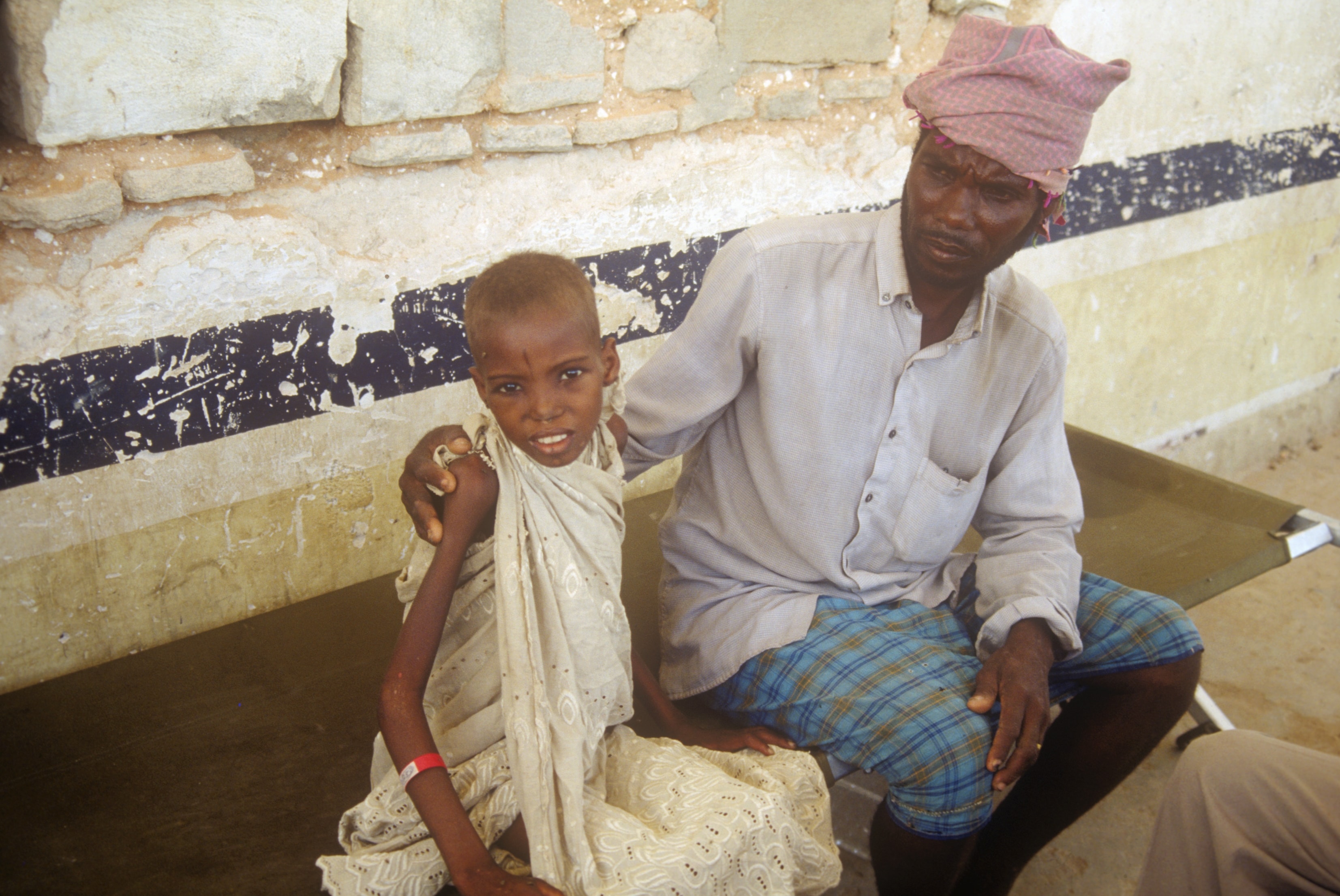A father and his young child at a clinic in Somalia