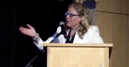 Dr. Susan Vitalis at the podium